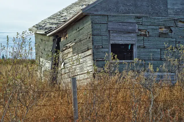 Abandoned weathered farmhouse near Delmas